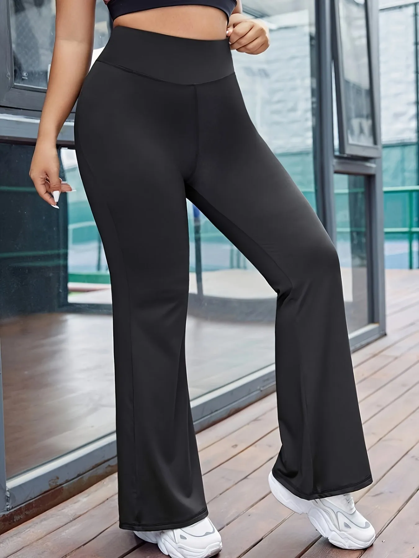 xieyinshe  Plus Size Sports Pants, Women's Plus Solid High Rise Medium Stretch Flared Leg Trousers